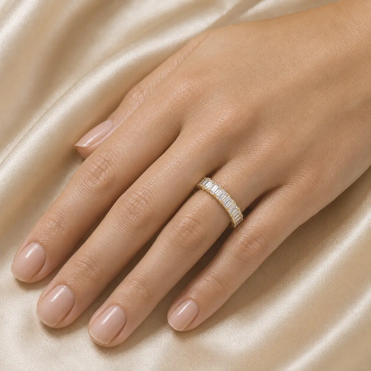 The Emerald Eternity worn on model in yellow gold